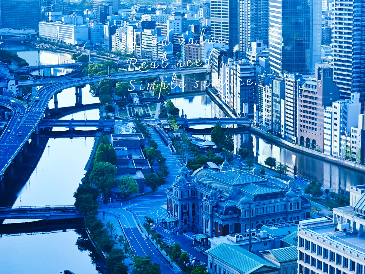 写真：担当者とお客さまの打ち合わせ風景